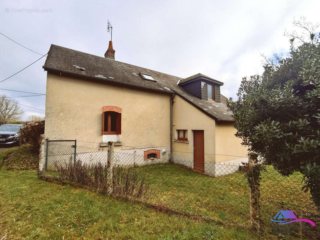 façade arrière - Maison à LIGNEROLLES