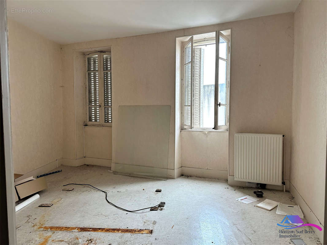 A l&#039;étage: chambre 1 de 17 m² - Appartement à CULAN