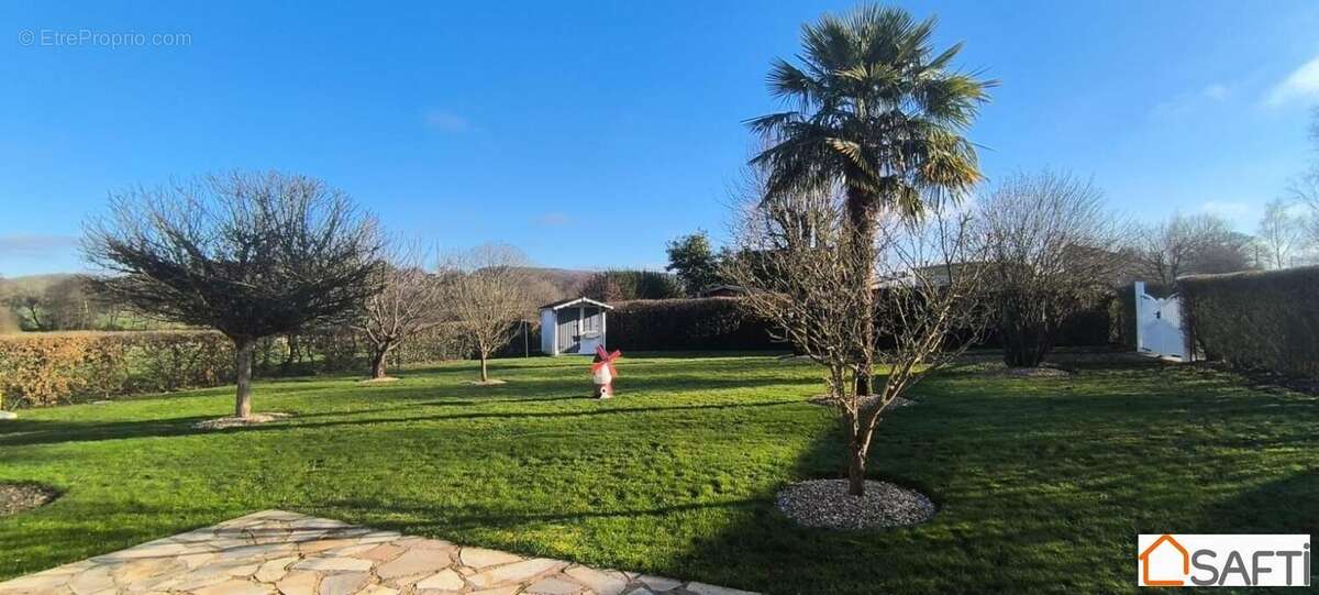 Photo 2 - Maison à LA MADELEINE-BOUVET