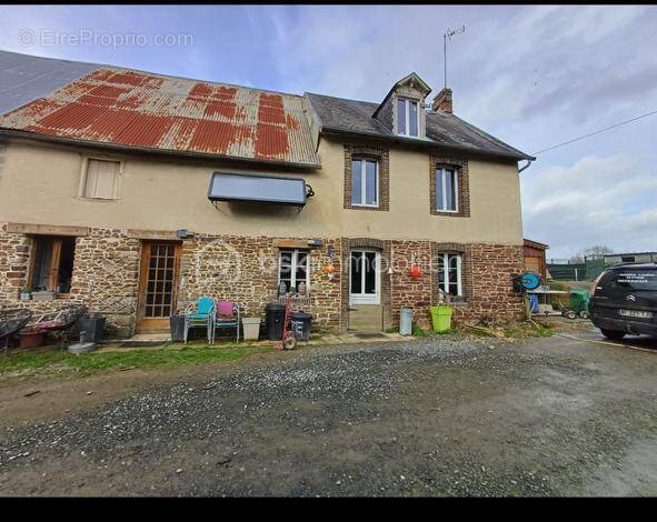 Maison à NOTRE-DAME-DE-CENILLY