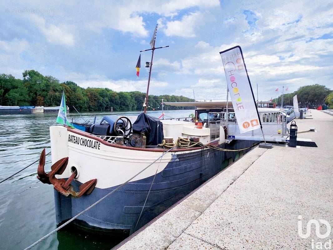 Photo 1 - Commerce à CONFLANS-SAINTE-HONORINE