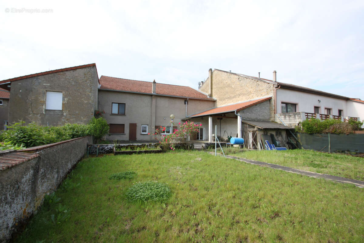 Maison à LOUVIGNY