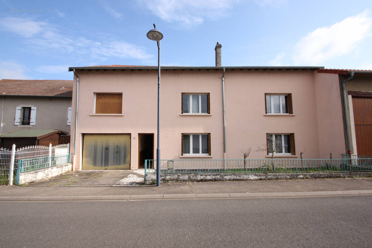 Maison à LOUVIGNY