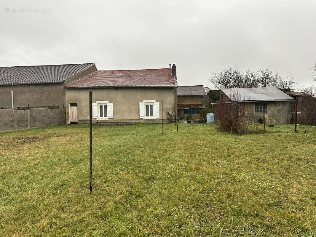 Maison à LOUVIGNY